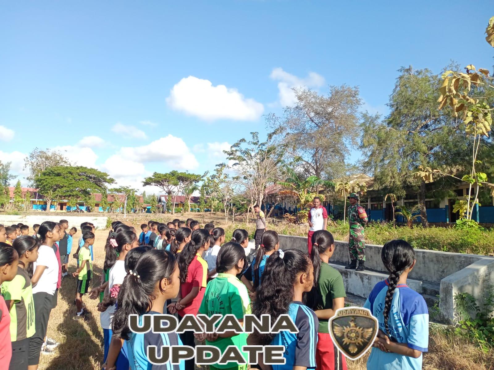 Babinsa Sertu Andre T Latih PBB Siswa Baru SMPN 1 Pantai Baru dalam Program MPLS