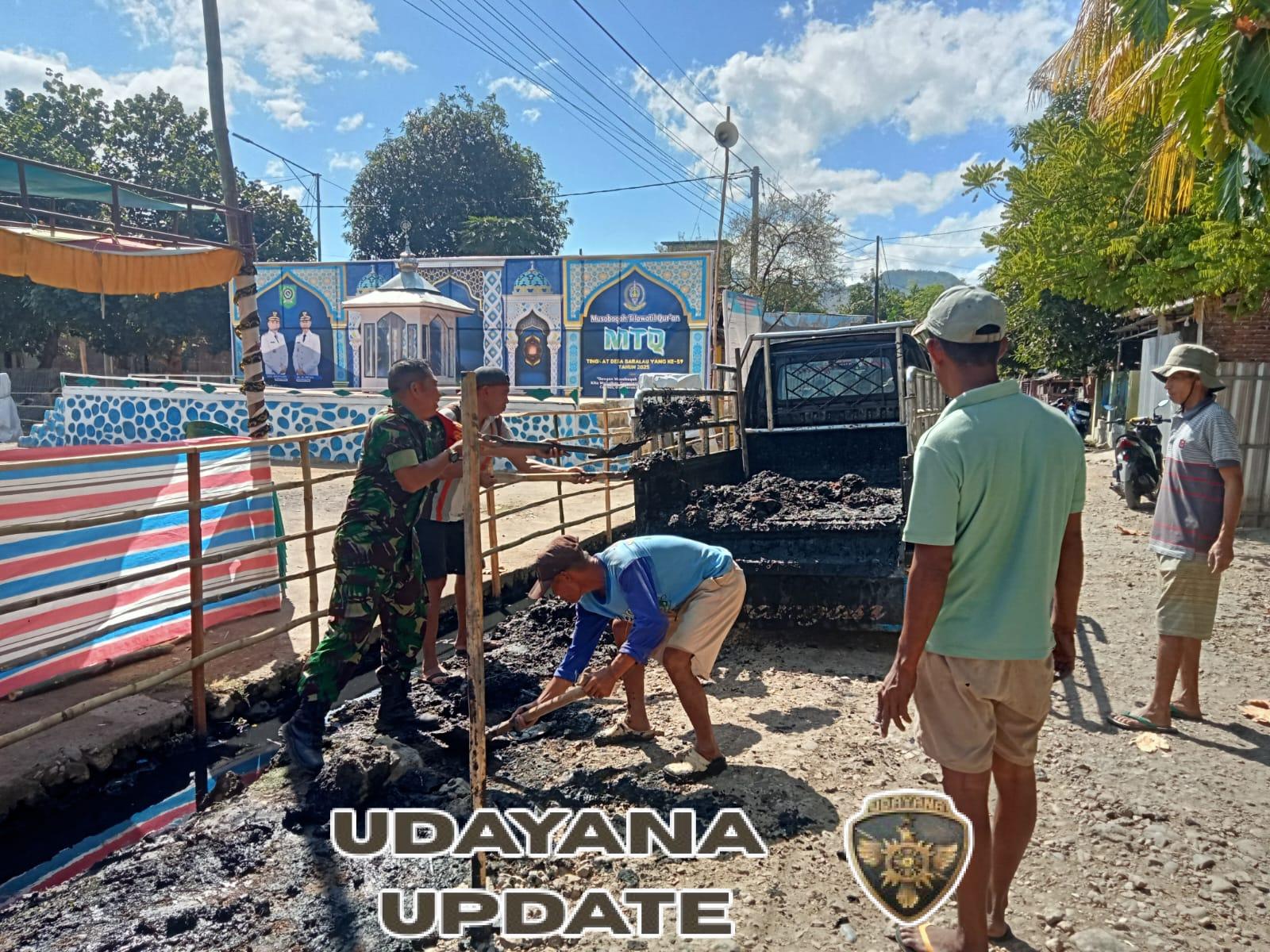 Babinsa Baralau Bersama Warga Gotong Royong Perbaiki Saluran Air Jalan Tente–Parado