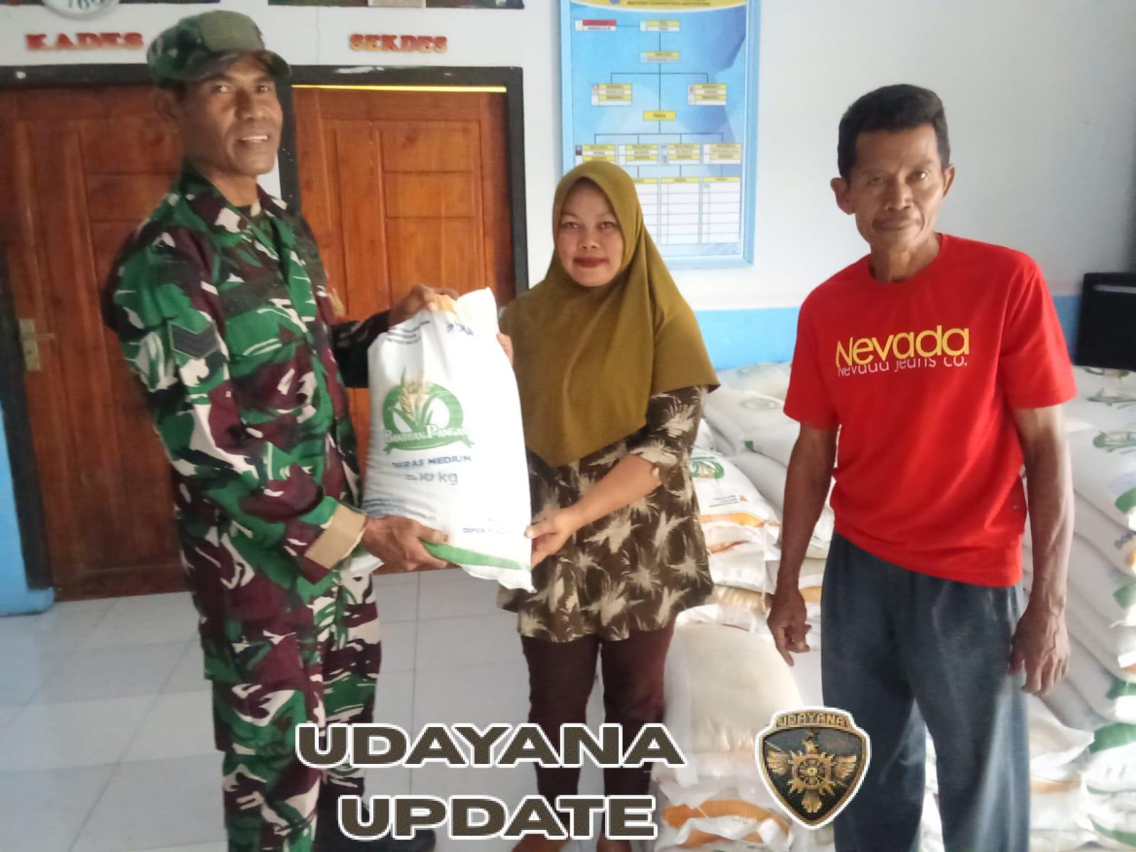 Babinsa Koramil 04 Woha Bersama Aparat Desa Pastikan Bantuan Beras Tepat Sasaran