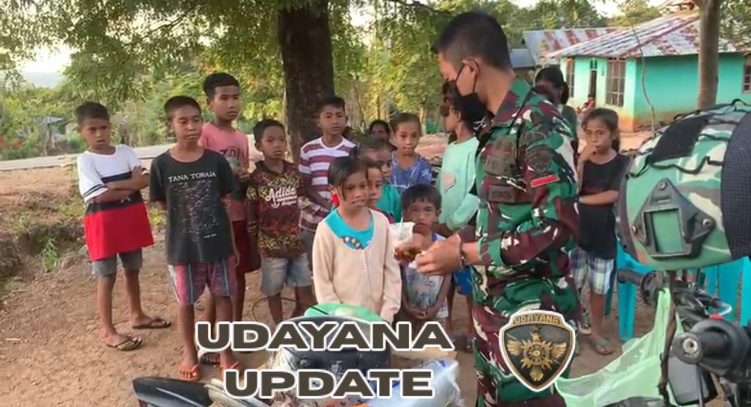 Satgas Pos Asumanu Berbagi Kepada Masyarakat Binaan Lewat Bubur Kacang Gratis