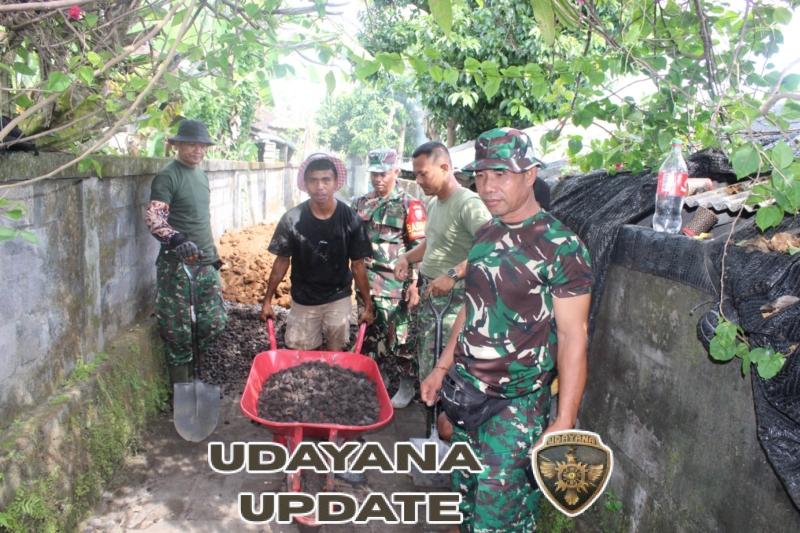 Babinsa Tak Pernah Absen, Serda Suparman Siaga Kawal Kegiatan TMMD di Desa Batuan