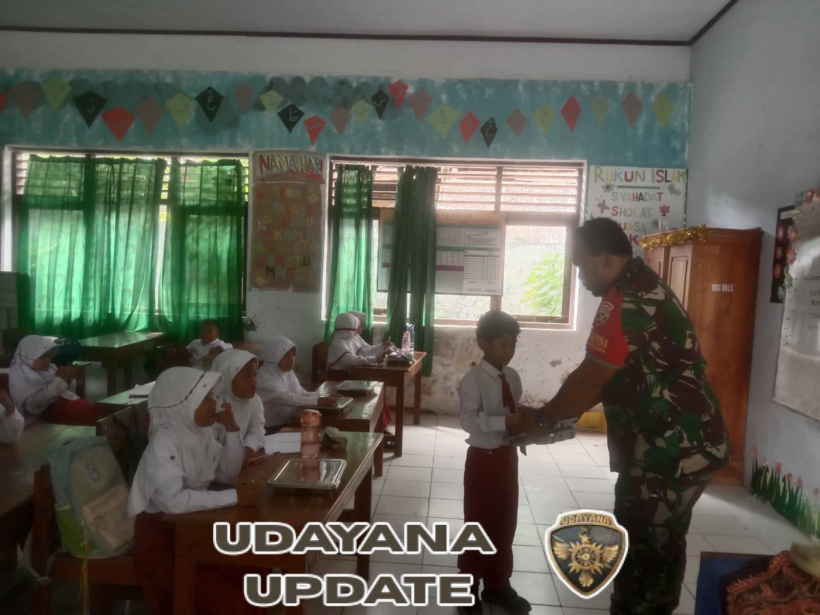 Babinsa Koramil 1608-01/Rasanae Kolaborasi Sukses Salurkan Paket Makan Bergizi Gratis