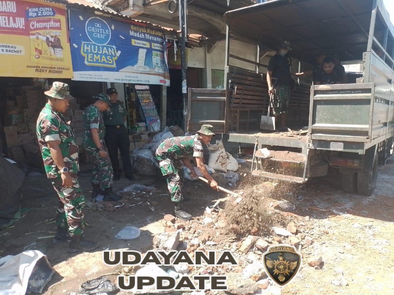 Kapten Inf Abdul Wahab Gerakkan Anggota Perbaiki Jalan Demi Keselamatan Warga