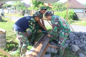 Tegas dan Humanis, Dansatgas Letkol Rizal Pimpin Pembangunan Infrastruktur Vital di Desa Batuan