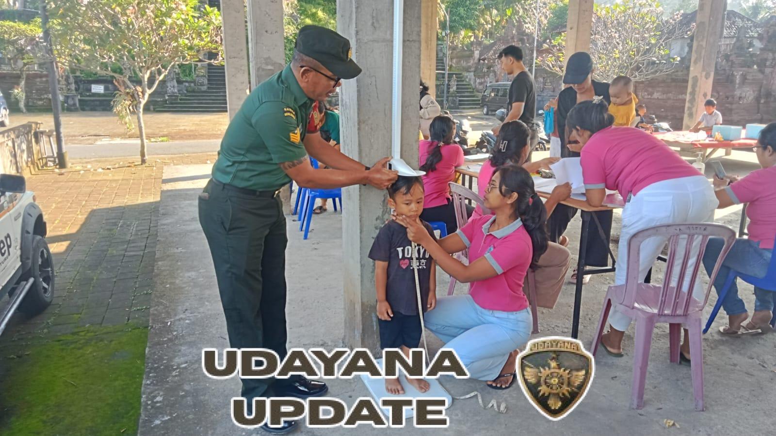 Babinsa Koramil 1616-01/Gianyar Turun Langsung Dukung Program Posyandu Terpadu