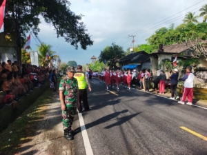 Sambut HUT kemerdekaan RI ke-80, Danramil 1623-03/Rendang bersama forkopimcam hadiri kegiatan lomba gerak jalan.