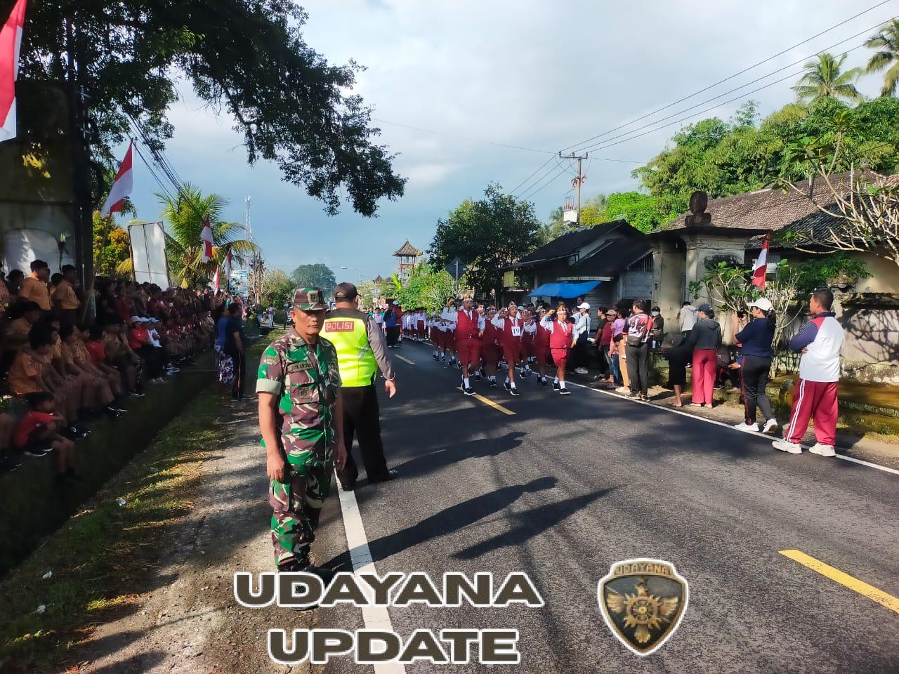 Sambut HUT kemerdekaan RI ke-80, Danramil 1623-03/Rendang bersama forkopimcam hadiri kegiatan lomba gerak jalan.