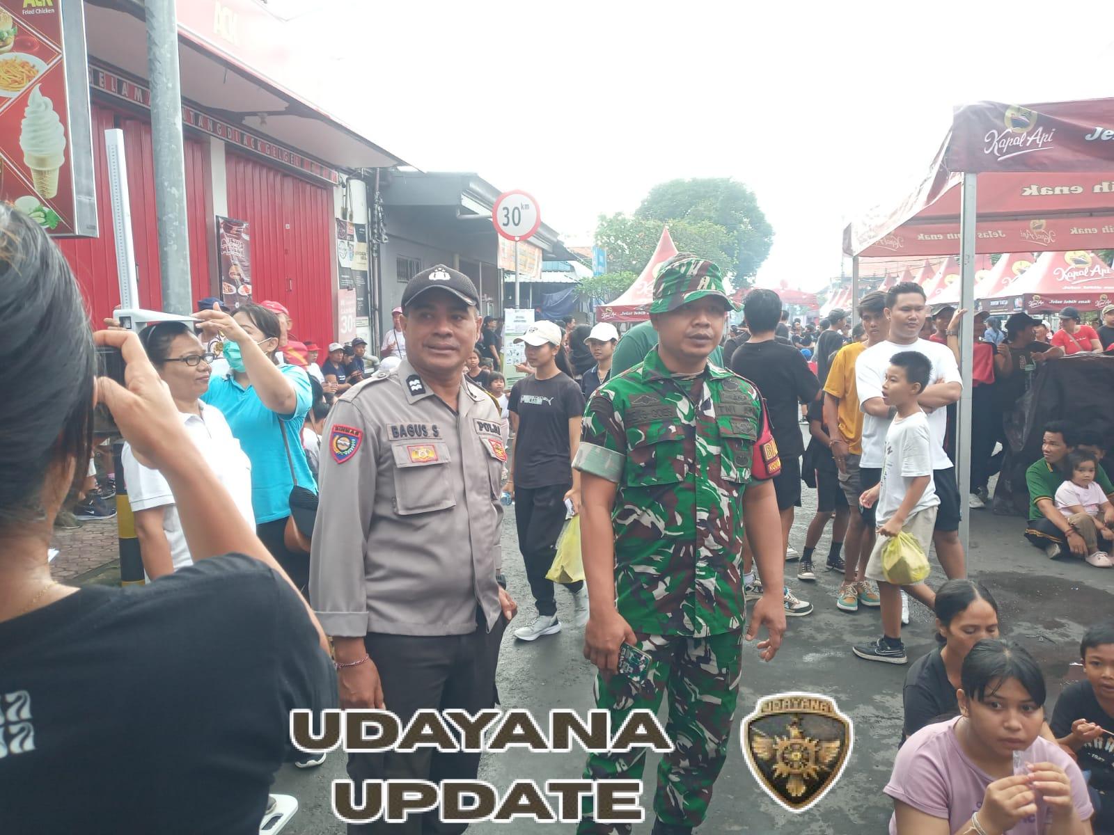 Babinsa Gelgel Kawal Jalan Santai   Swecapura Festival