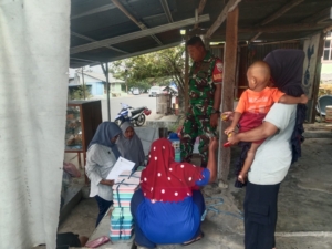 Sinergi TNI dan Masyarakat di Lingkungan Kuzazo Melalui Kegiatan Pamwil dan Monitoring