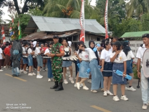 Babinsa Koramil 1602-01 Hadir Mendampingi Warga di Karnaval Kecamatan Nangapanda