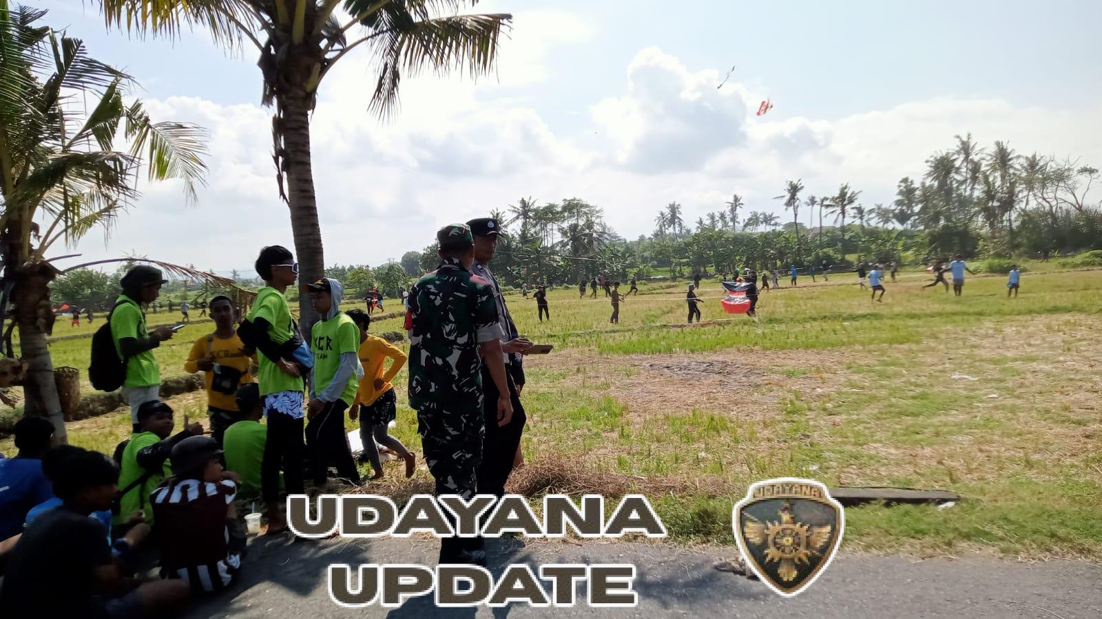 Babinsa Bersama Pecalang dan Bhabinkamtibmas Ciptakan Keamanan di Lomba STT Medahan