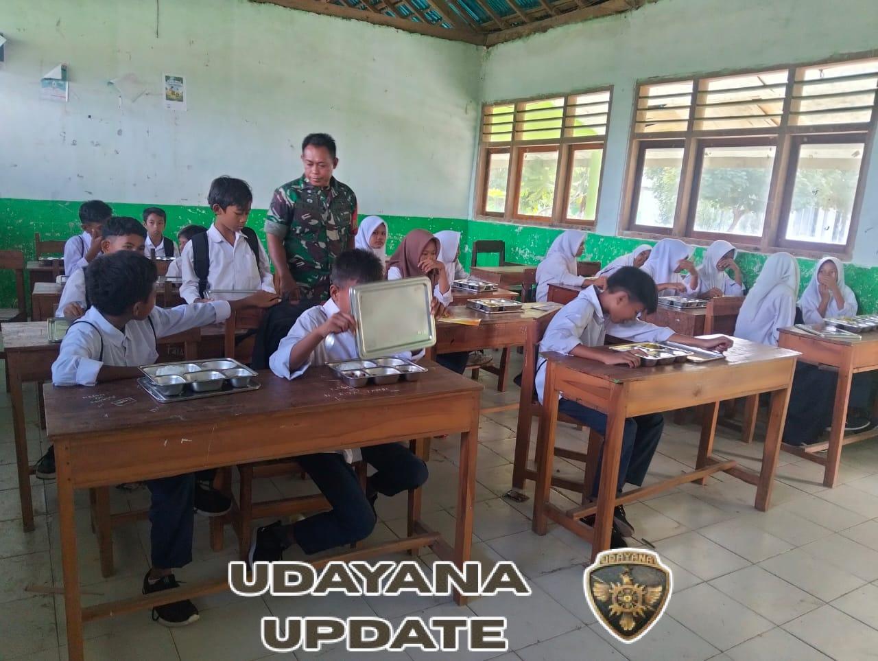 Koramil 02 Bolo Salurkan Ribuan Paket Makan Bergizi Gratis di Madapangga