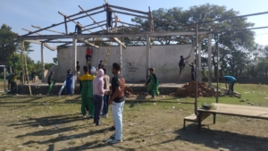 Satgas TMMD dan Warga Kalabeso Rehab Tribun Lapangan Sepak Bola, Dorong Semangat Olahraga