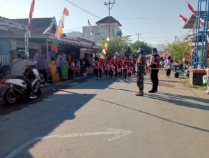 Koramil 05/Jereweh Amankan Lomba Gerak Jalan Semarak HUT RI Ke-80