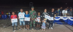 Babinsa Koramil Camplong Hadir di Tengah Ribuan Penonton Pacuan