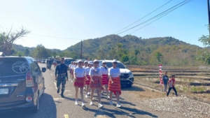 Semarak HUT RI ke-80 Satgas Pamtas Yonif 741/GN Pos Salore Dampingi Gerak Jalan 17 KM Desa Tulakadi