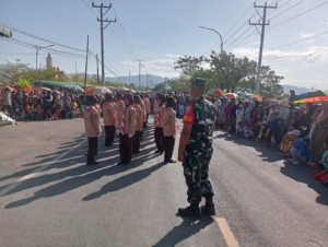 Babinsa Dadibou Dampingi Lomba Gerak Jalan Indah HUT RI ke-80 di Kabupaten Bima