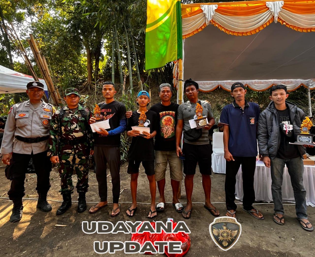 Babinsa Batubulan Kangin Amankan Lomba Mancing Air Deras HUT Desa