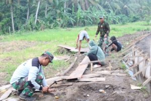Dan SSK TMMD 125 Pimpin Langsung Pengerjaan Jalan Usaha Tani dan Saluran Air Primer di Desa Batuan