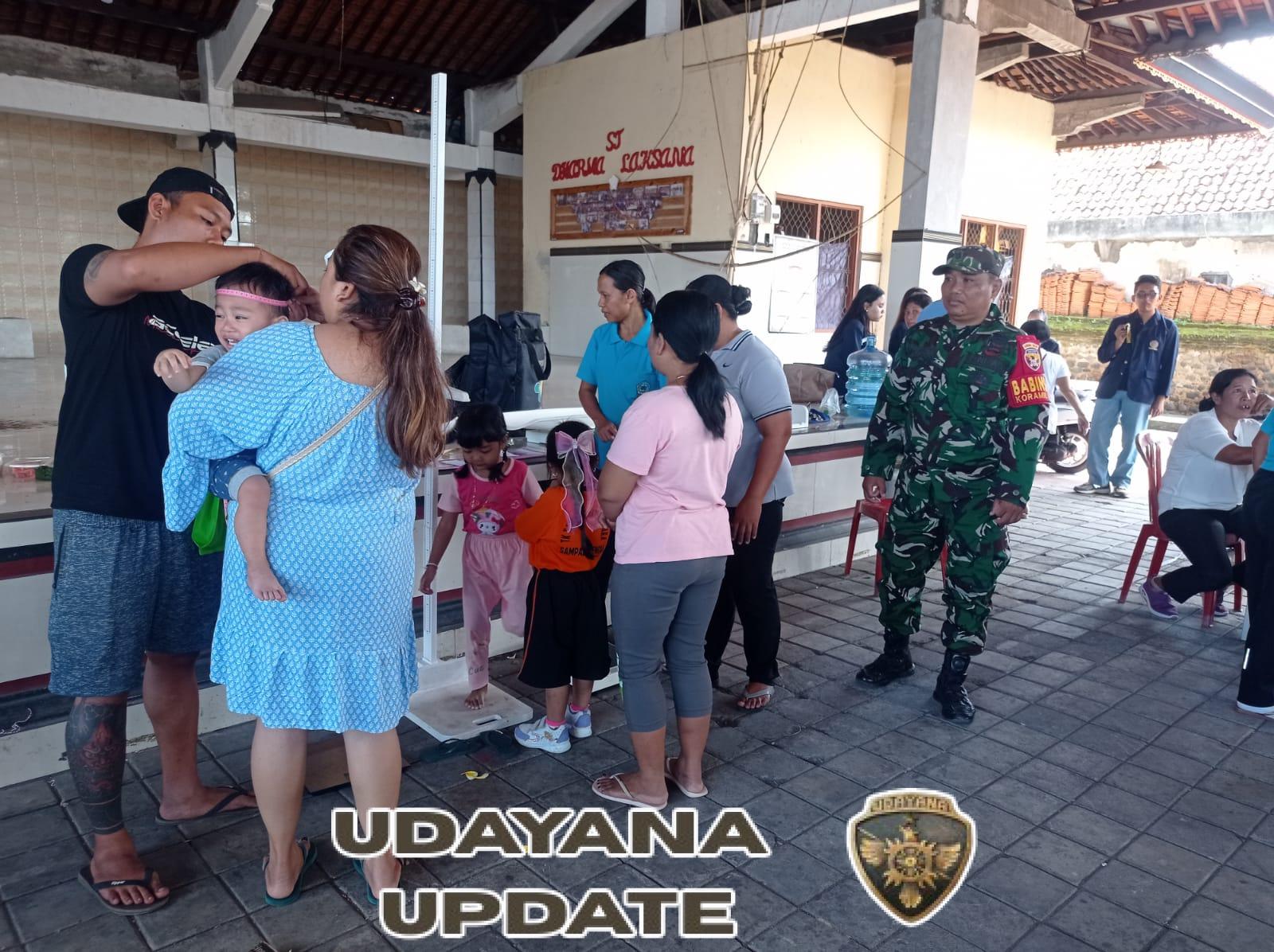 Beri Pendampingan Posyandu Balita, Babinsa Sampalan Tengah  Pastikan Balita Di Wilayah Binaan Selalu Sehat