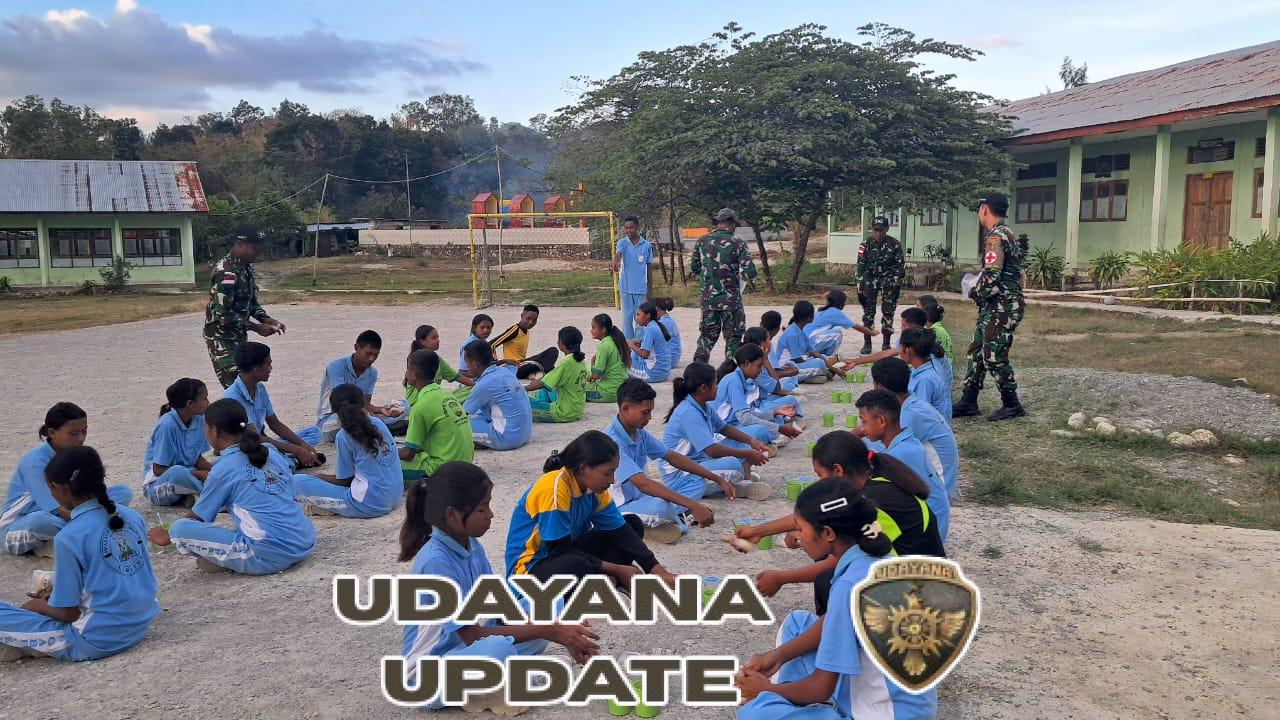 Satgas Pos Mahen Dukung Kegiatan Latihan Paskibraka Dengan Bagikan Bubur Kacang dan Susu di SMA Gabriel Manek