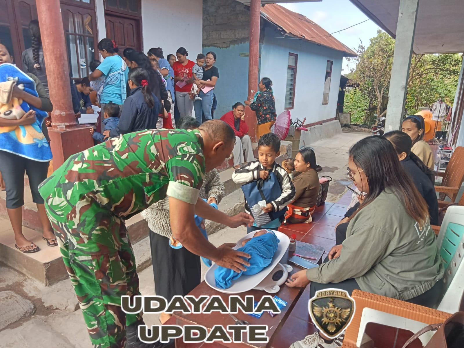 Babinsa Kodim 1621/TTS Dampingi Posyandu Balita (Pemberian Vitamin A & Obat Cacing)