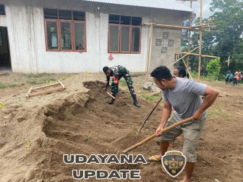 Peduli lingkungan Babinsa ajak warga memratakan tanah di samping gereja