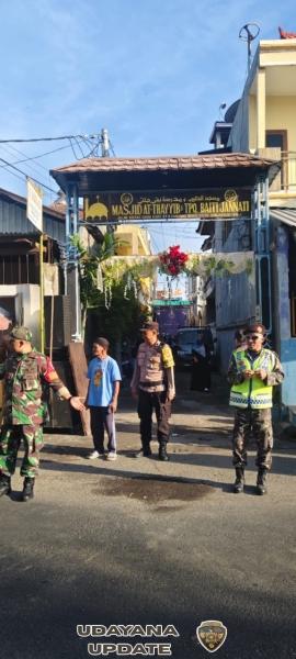 Babinsa Kampung Bugis Kawal Pawai Ta’aruf Maulid Nabi dengan Aman dan Khidmat