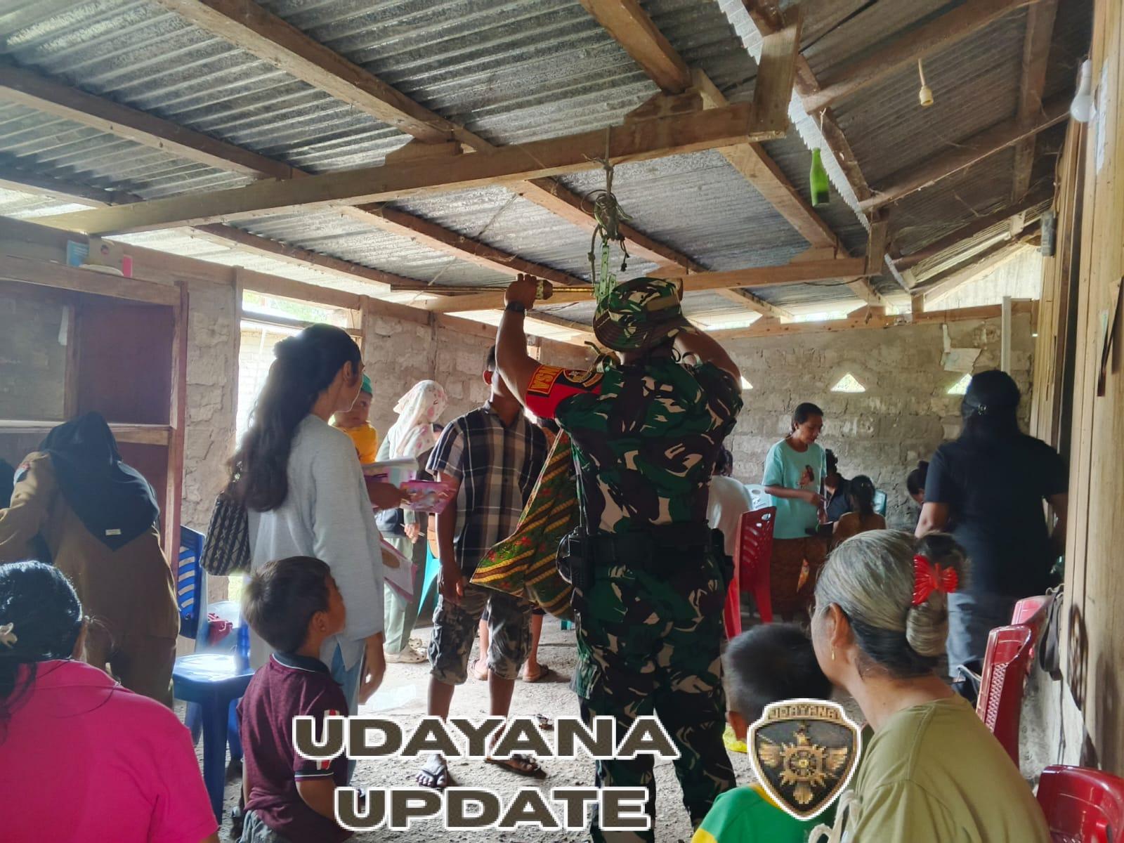 Babinsa Koramil 06/Karera Dampingi Kegiatan Posyandu Bayi Balita di Desa Ngonggi