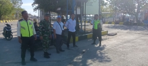 Babinsa Senayan Kawal Pengamanan di Pelabuhan Poto Tano