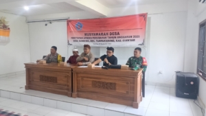 Babinsa Sanding Kopda Komang Agus Brono Mas Hadiri Rapat Penetapan Perubahan APBDes 2025