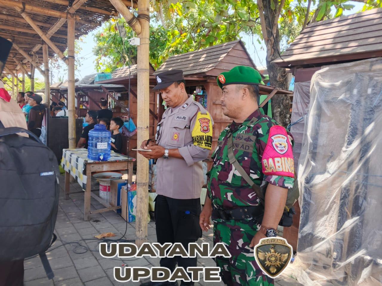 Babinsa Giri Emas dan Bhabinkamtibmas Laksanakan Pengamanan Pesta Siaga Tahun 2025 di Pantai Giri Emas