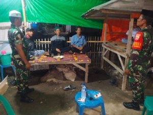 Sinergi TNI, Aparat Desa, dan Warga Dalam Patroli Malam di Kecamatan Lambu