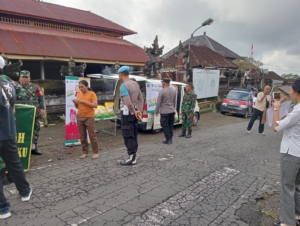 Sambut HUT ke-80 TNI, Koramil 1626-03/Tembuku Bersama Polsek dan Pemerintah Kecamatan Salurkan Beras SPHP