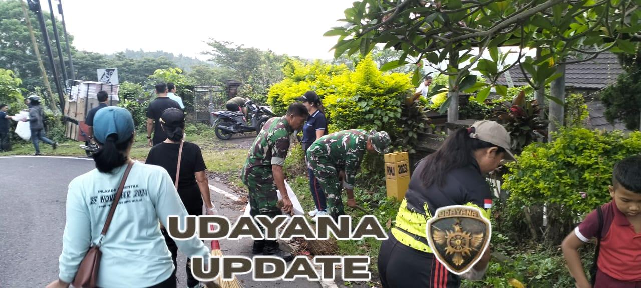 Ciptakan lingkungan yang bersih dan sehat, Anggota Koramil 1623-03/Rendang bersama instansi terkait laksanakan gotong royong.