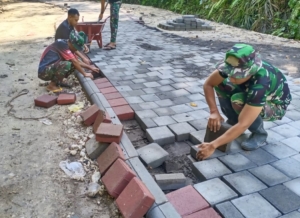 TNI dan Masyarakat Sinergi dalam Bergotong Royong bersama di TMMD Ke-126 Kodim 1611/Badung