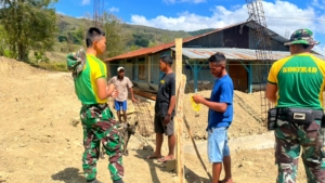 Satgas Yonarmed 12 Kostrad Perkokoh Pendidikan Lewat Pembangunan Pondasi Sekolah
