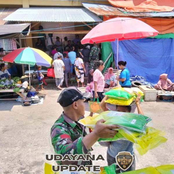 Babinsa Turut Serta dalam Kegiatan Beras Murah untuk Masyarakat di Lamawalang