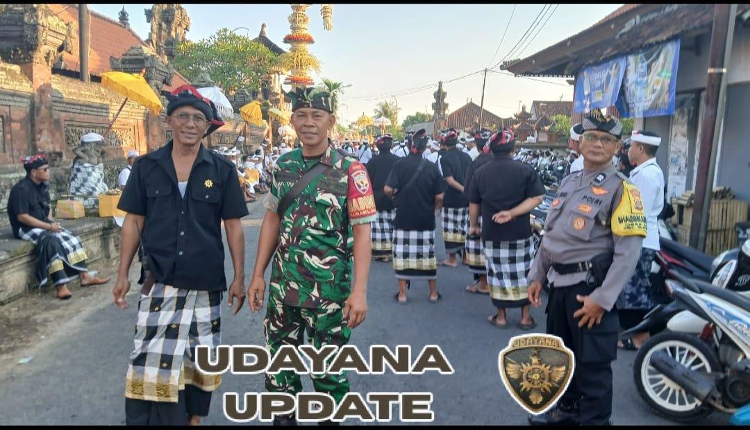 Babinsa Serda I Nyoman Widastra Turut Kawal Prosesi Mecaru Demi Keselamatan dan Keharmonisan Alam