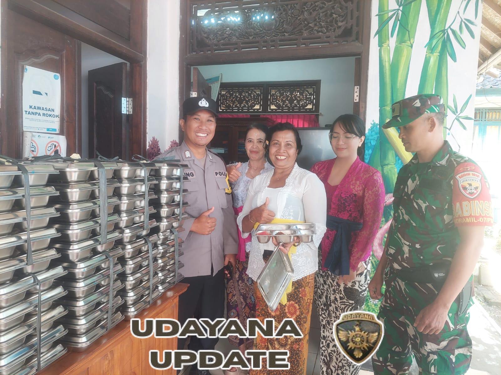 Dukung Kesehatan Anak Bangsa, Babinsa Kawal Penyaluran Makanan Bergizi di Desa Melinggih