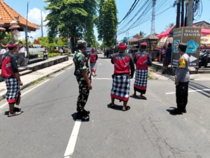 Babinsa Abianbase Bersinergi Amankan Prosesi Upacara Pitra Yadnya