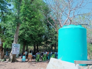 Babinsa Pantai Baru Hadiri Serah Terima Pengembangan Air Bersih di Desa Tunganamo