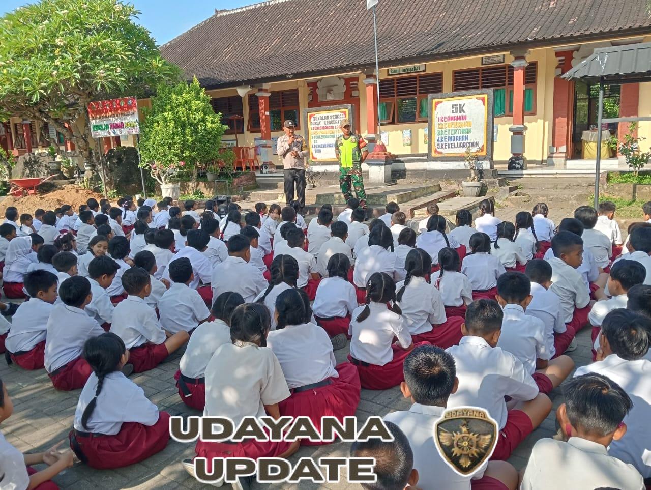 Babinsa dan Bhabinkamtibmas Beri Sosialisasi Hukum di SD N 1 Serongga