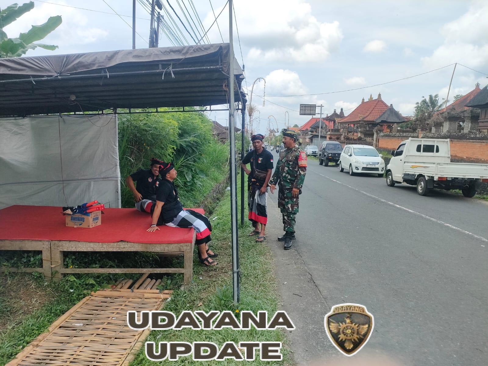 Babinsa Desa Tiga Laksanakan Pengamanan Upacara Keagamaan di Pura Penataran Bale Agung