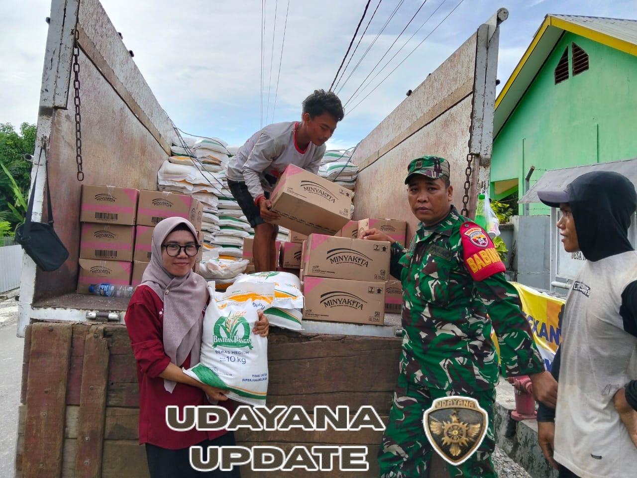 Babinsa Desa Tamekan Dampingi Penyaluran Bantuan Pangan Beras dan Minyak Goreng untuk 164 Warga