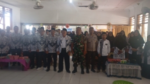 Babinsa Desa Maluk Hadiri Konferensi Cabang PGRI Tahun 2025 di SD Negeri 2 Maluk