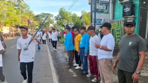 HUT ke-15 Desa Bunga Eja: Babinsa Dampingi Warga dalam Jalan Santai Meriah