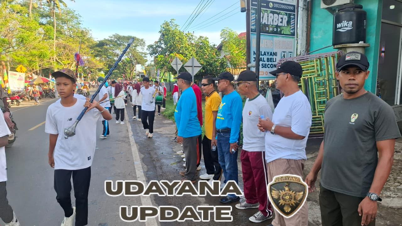 HUT ke-15 Desa Bunga Eja: Babinsa Dampingi Warga dalam Jalan Santai Meriah