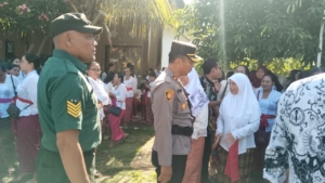 Sinergi TNI dan Pendidikan: Babinsa Banyupoh Hadiri Perayaan HUT PGRI ke-80 dan Hari Guru Nasional di Gerokgak