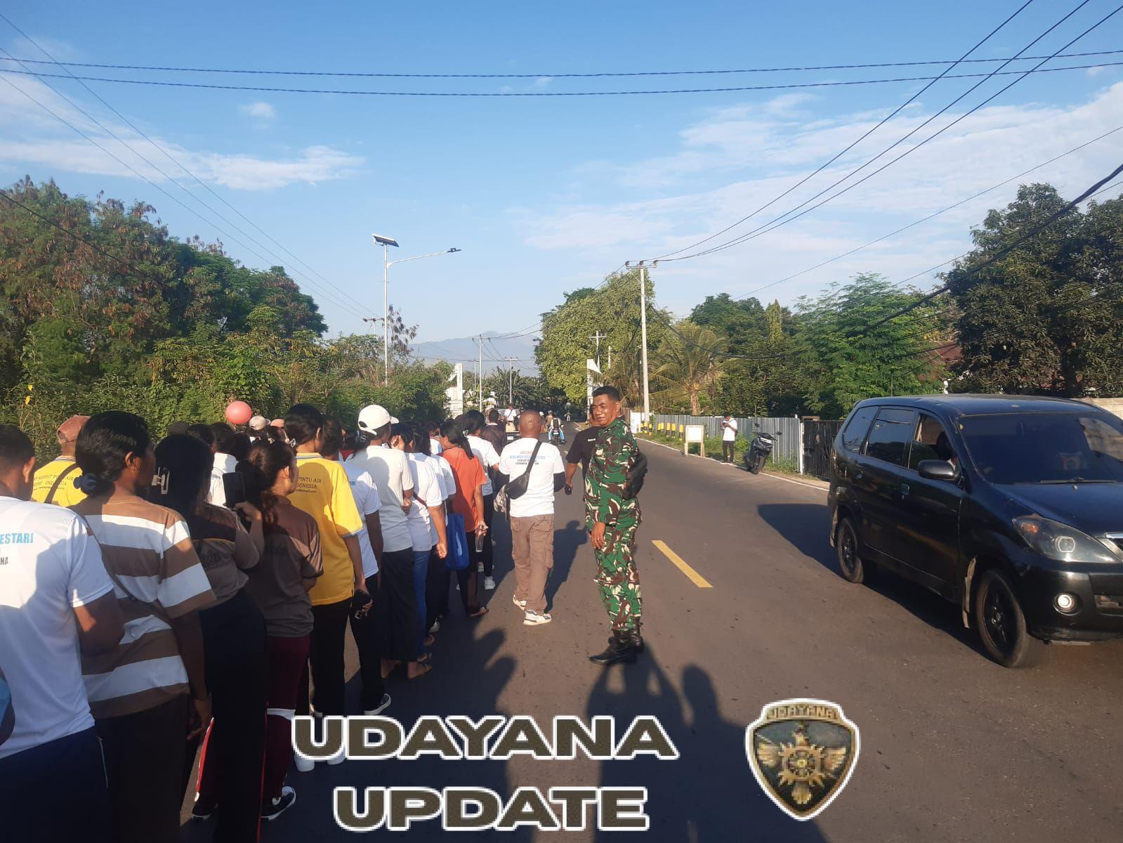 Wujudkan Kebersamaan, Babinsa Kawal Jalan Sehat Peringatan Ulang Tahun Desa Watuliwung